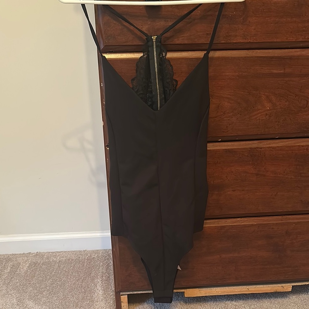 Rue21 Black One Piece Bodysuit with V-Neck